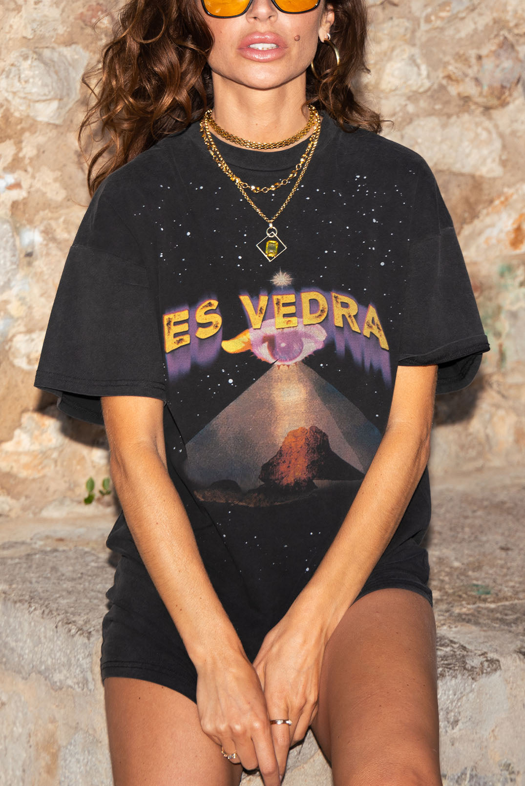 Girl in black ibiza T-shirt dress