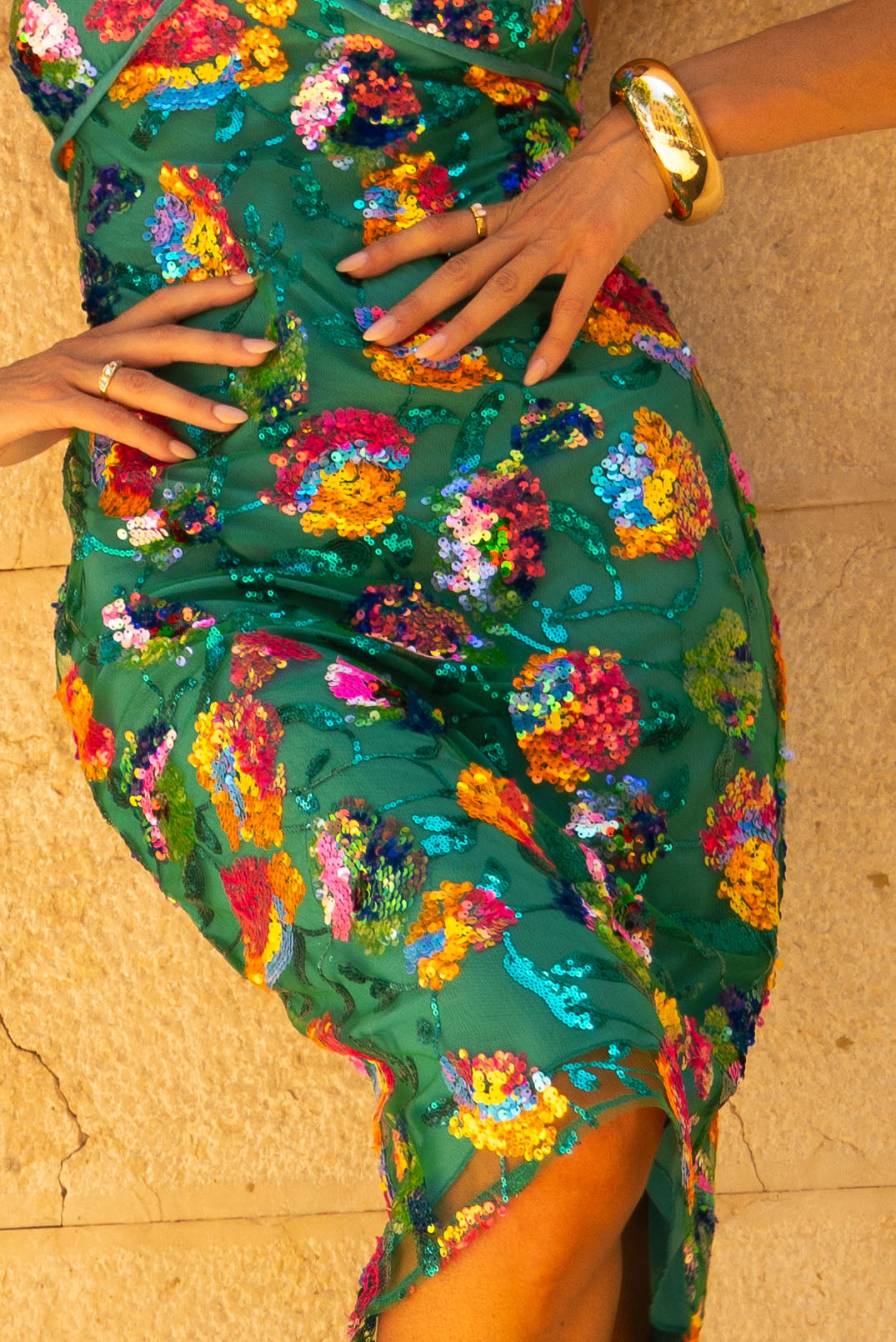 close up of green sequin holiday party midi dress